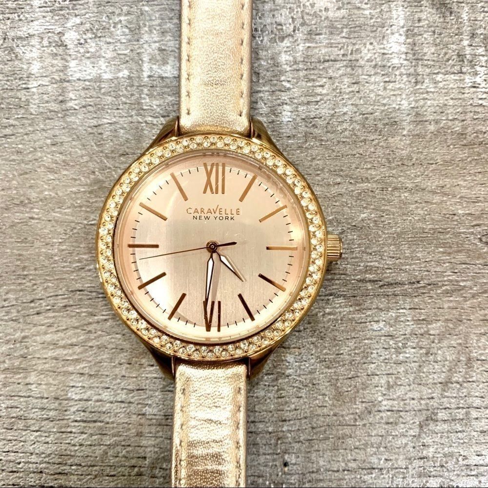 Caravelle rose gold watch  